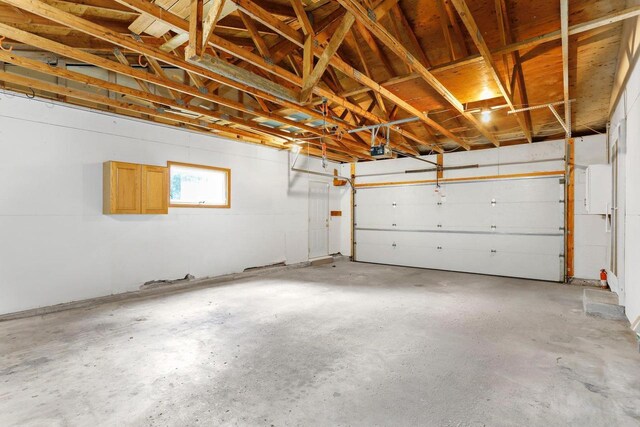 2806 Mckenna Blvd, Madison, WI 53719 - garage featuring a garage door opener