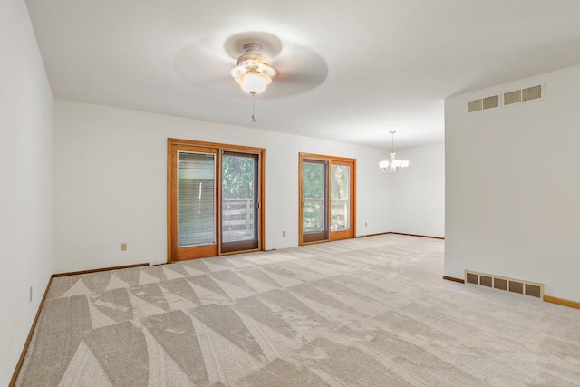 2806 Mckenna Blvd, Madison, WI 53719 - empty room with ceiling fan, a chandelier, and light carpet
