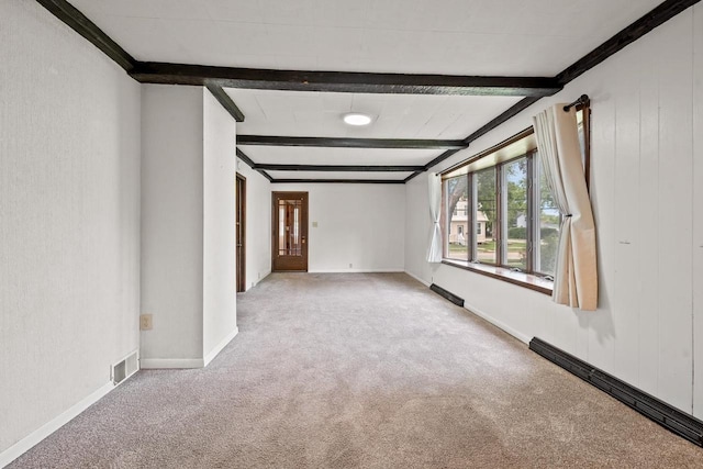 911 W Bent Ave, Oshkosh, WI 54901 - unfurnished room with carpet and beam ceiling