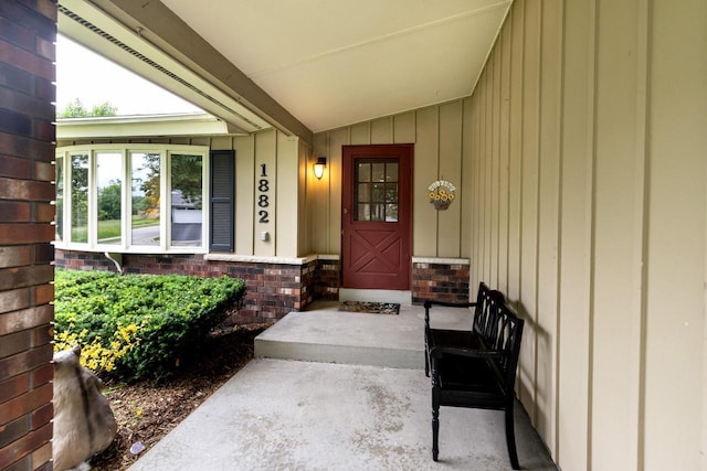 1882 Davis Ln, Waukesha, WI 53189 - doorway to property featuring board and batten siding