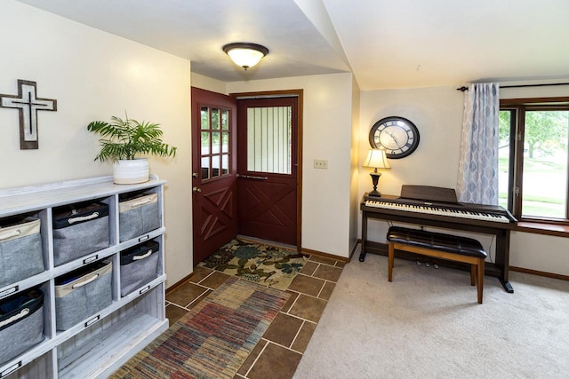 1882 Davis Ln, Waukesha, WI 53189 - foyer featuring baseboards and dark tile patterned floors