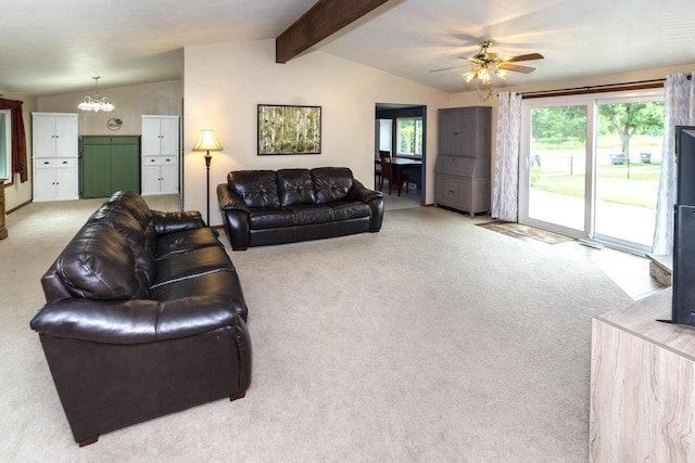 1882 Davis Ln, Waukesha, WI 53189 - living area featuring light colored carpet, a chandelier, and a ceiling fan