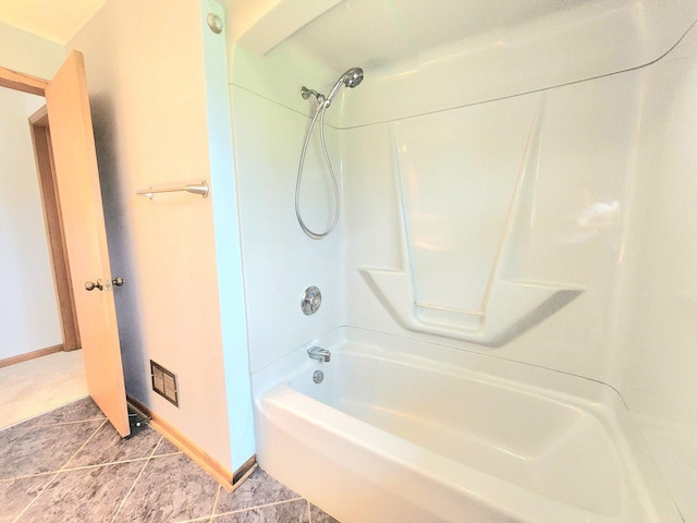 2518 Main Ave, Sheboygan, WI 53083 - bathroom with washtub / shower combination and tile patterned floors