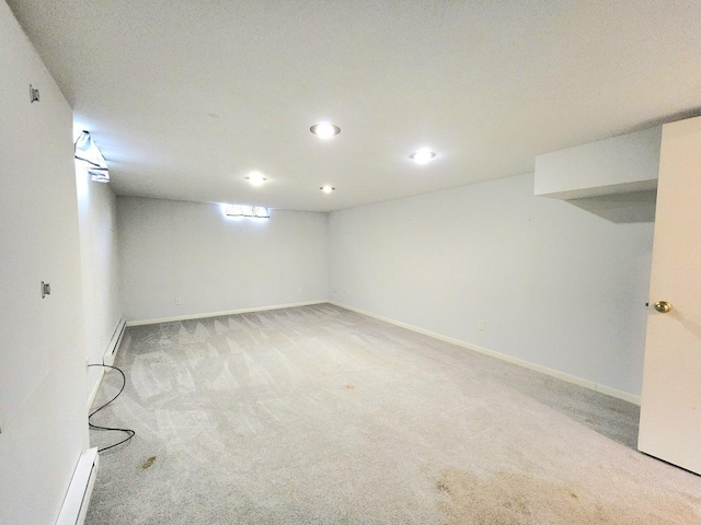 2518 Main Ave, Sheboygan, WI 53083 - basement featuring light colored carpet, a baseboard radiator, baseboard heating, and recessed lighting