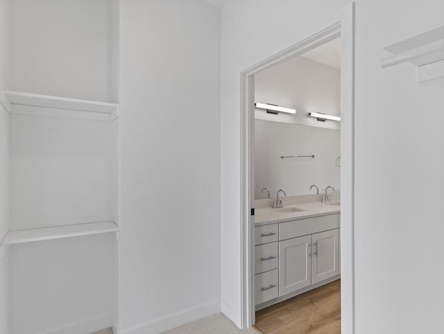 4199 E Hemlock Dr Unit 108, Oak Creek, WI 53154 - bathroom featuring vanity and wood finished floors