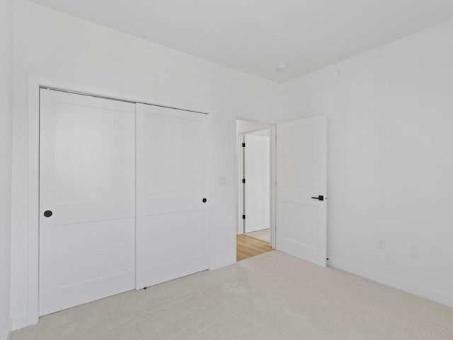 4199 E Hemlock Dr Unit 108, Oak Creek, WI 53154 - unfurnished bedroom featuring carpet flooring and a closet