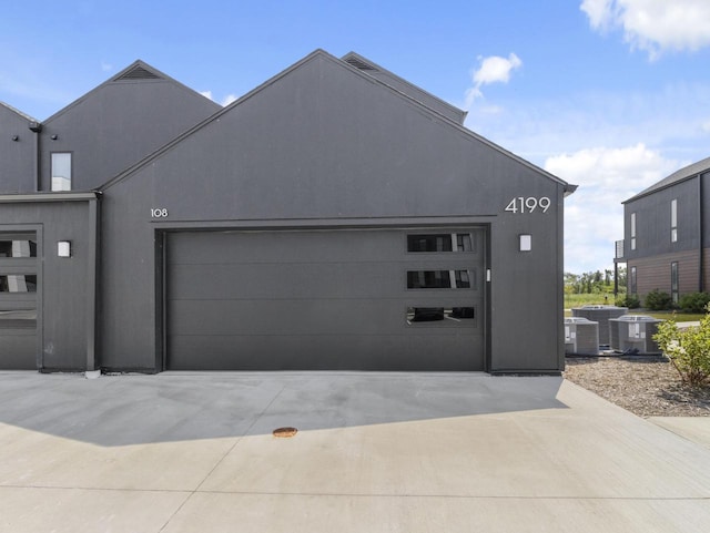 4199 E Hemlock Dr Unit 108, Oak Creek, WI 53154 - view of front facade with a garage
