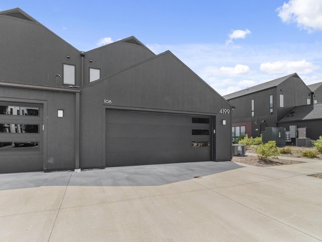 4199 E Hemlock Dr Unit 108, Oak Creek, WI 53154 - view of front of house featuring driveway and an attached garage