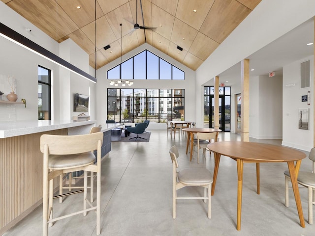 4199 E Hemlock Dr Unit 108, Oak Creek, WI 53154 - dining room with finished concrete flooring and high vaulted ceiling