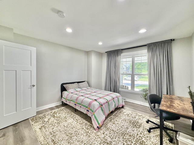 2324 Boulder Ln, Beloit, WI 53511 - bedroom with wood finished floors and recessed lighting