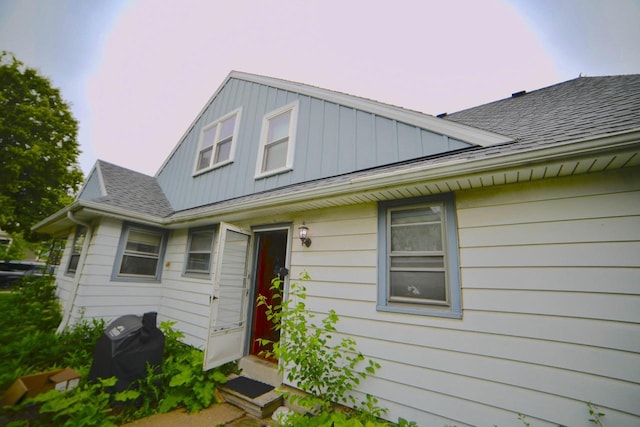 6818 W Morgan Ave, Milwaukee, WI 53220 - bungalow-style house with board and batten siding and a shingled roof