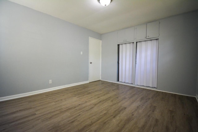 5625 N 57th St, Milwaukee, WI 53218 - spare room featuring dark wood-style floors