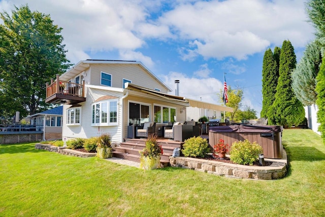 442 E Richardson Springs Rd, Edgerton, WI 53534 - back of house with a hot tub, a yard, a balcony, and outdoor lounge area