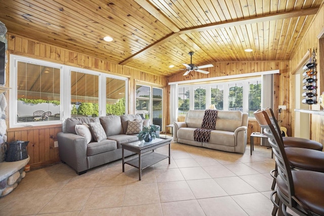 442 E Richardson Springs Rd, Edgerton, WI 53534 - living room with wood walls, wooden ceiling, light tile patterned floors, ceiling fan, and vaulted ceiling
