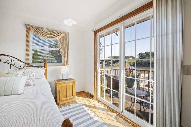 442 E Richardson Springs Rd, Edgerton, WI 53534 - bedroom with crown molding and light wood-style flooring
