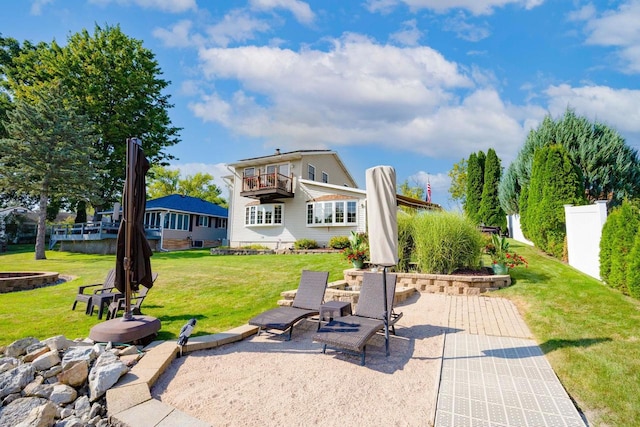 442 E Richardson Springs Rd, Edgerton, WI 53534 - back of property featuring a patio, a balcony, and an outdoor fire pit