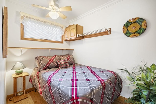 442 E Richardson Springs Rd, Edgerton, WI 53534 - bedroom with ornamental molding, wood finished floors, and a ceiling fan
