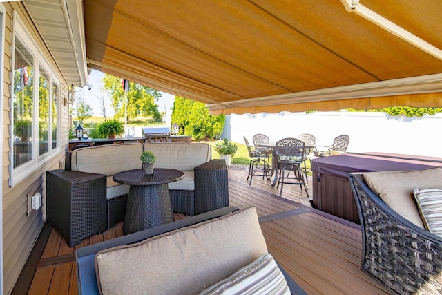 442 E Richardson Springs Rd, Edgerton, WI 53534 - wooden terrace with outdoor dining area and a hot tub