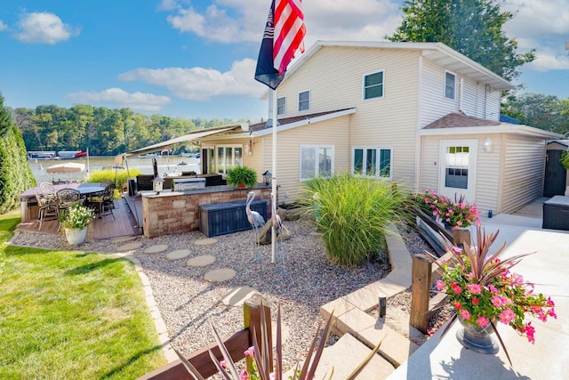 442 E Richardson Springs Rd, Edgerton, WI 53534 - back of house featuring an outdoor kitchen, a patio, and outdoor dining area