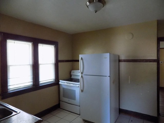 3152 N 38th St Unit 3154, Milwaukee, WI 53216 - kitchen featuring white appliances and light tile patterned floors