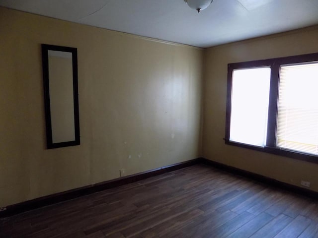 3152 N 38th St Unit 3154, Milwaukee, WI 53216 - empty room with dark wood-style flooring and baseboards
