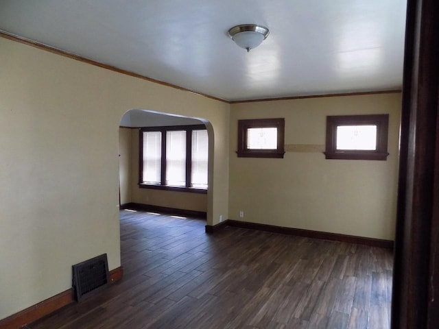3152 N 38th St Unit 3154, Milwaukee, WI 53216 - unfurnished room featuring arched walkways, ornamental molding, and dark wood-style flooring