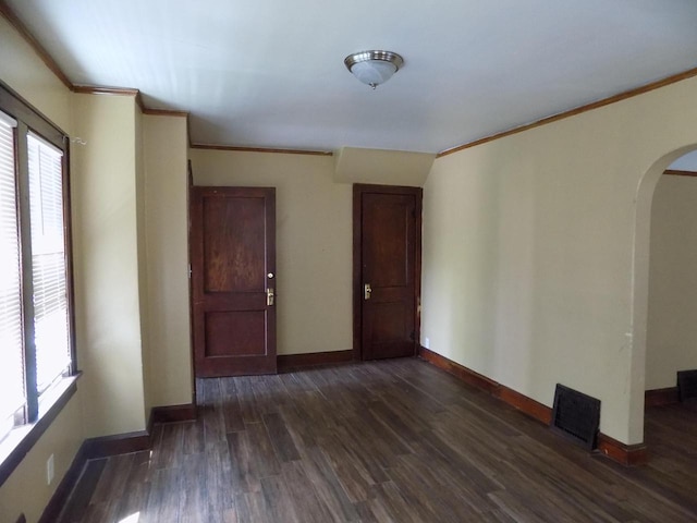 3152 N 38th St Unit 3154, Milwaukee, WI 53216 - spare room featuring arched walkways, ornamental molding, healthy amount of natural light, and dark wood-style flooring