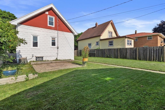 2147 S 71st St, West Allis, WI 53219 - back of property featuring a patio