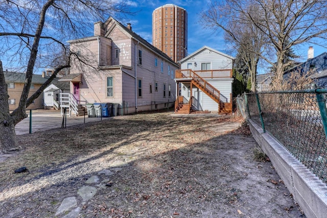 1626 N Warren Ave, Milwaukee, WI 53202 - view of side of home with a chimney and stairway