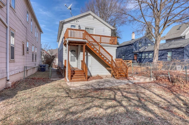 1626 N Warren Ave, Milwaukee, WI 53202 - back of property with stairway, a gate, and a deck