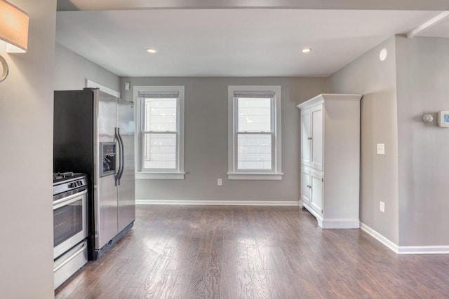 1626 N Warren Ave, Milwaukee, WI 53202 - kitchen with appliances with stainless steel finishes, dark wood-style floors, and recessed lighting