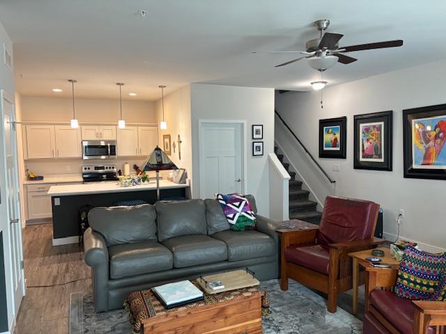 1965 N Windsor Ave, Cottage Grove, WI 53527 - living area featuring ceiling fan, stairs, and recessed lighting