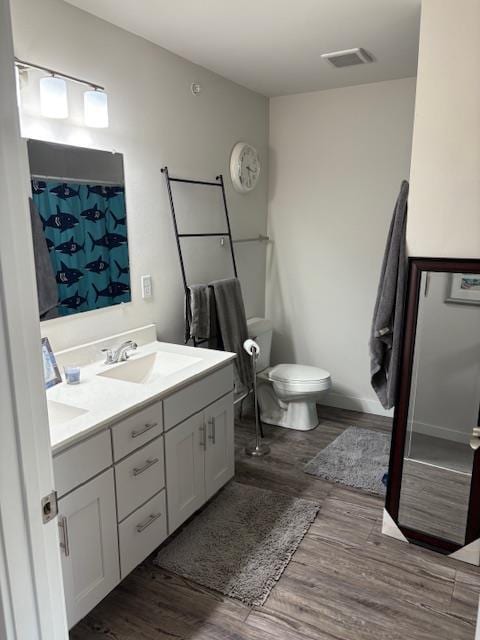 1965 N Windsor Ave, Cottage Grove, WI 53527 - bathroom featuring double vanity and wood finished floors