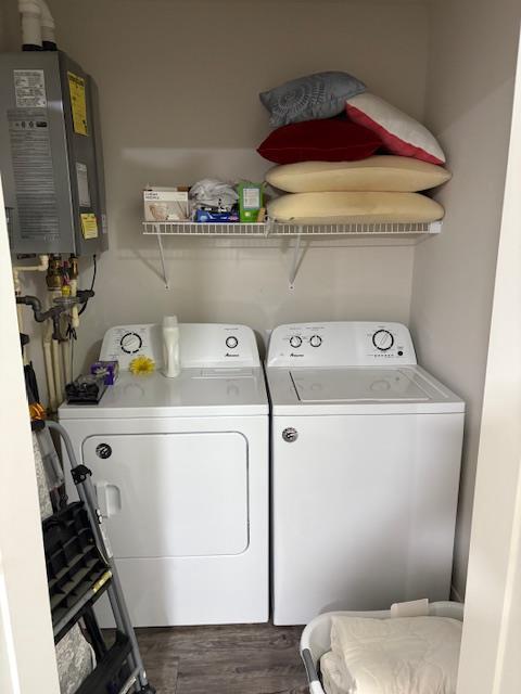 1965 N Windsor Ave, Cottage Grove, WI 53527 - laundry room featuring washer and clothes dryer, water heater, and wood finished floors