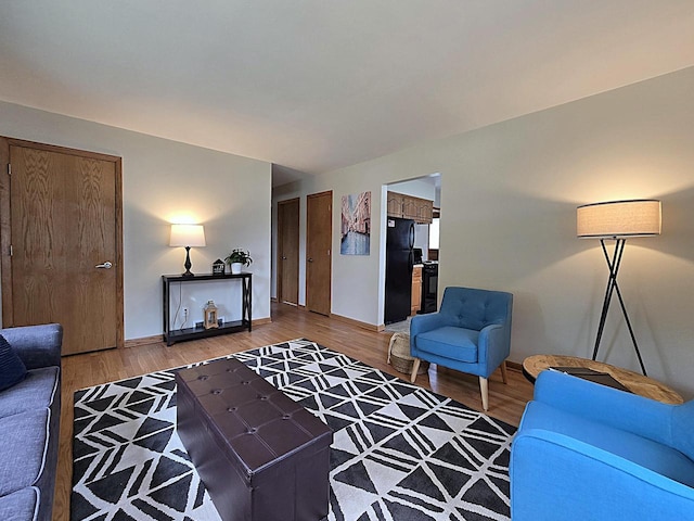 3680 E Klieforth Ave, Cudahy, WI 53110 - living room featuring wood finished floors and baseboards