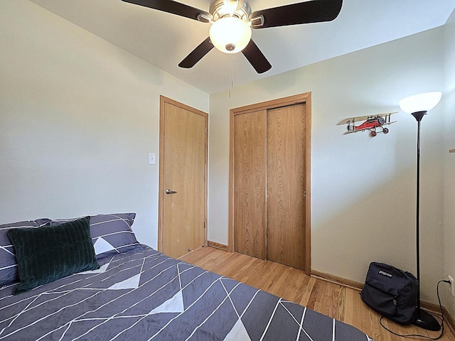 3680 E Klieforth Ave, Cudahy, WI 53110 - bedroom featuring wood finished floors, a ceiling fan, and a closet