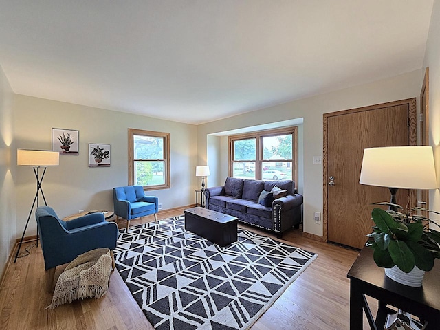 3680 E Klieforth Ave, Cudahy, WI 53110 - living room featuring light wood-style floors and baseboards