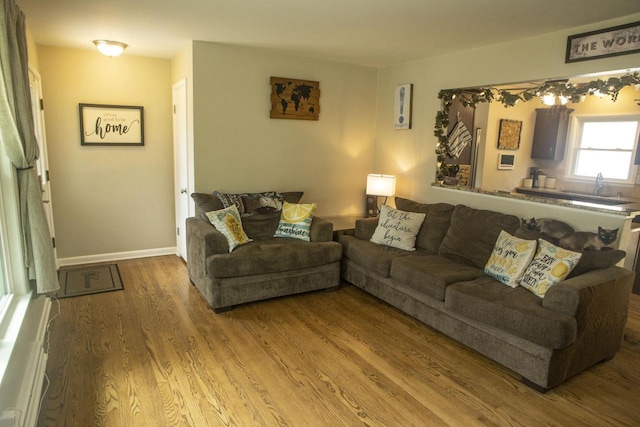 2563 S 91st St, West Allis, WI 53227 - living area featuring wood finished floors and baseboards