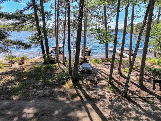 W6020 Northern Lights Cir Unit 7, Tomahawk, WI 54487 - water view featuring a dock