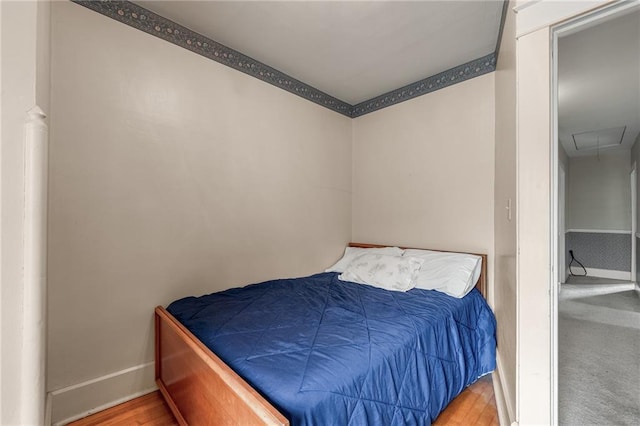 246 Coleman St, Chippewa Falls, WI 54729 - bedroom with baseboards and attic access