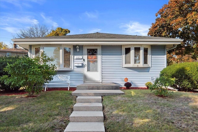 4683 N 80th St, Milwaukee, WI 53218 - bungalow-style home featuring a front lawn and roof with shingles