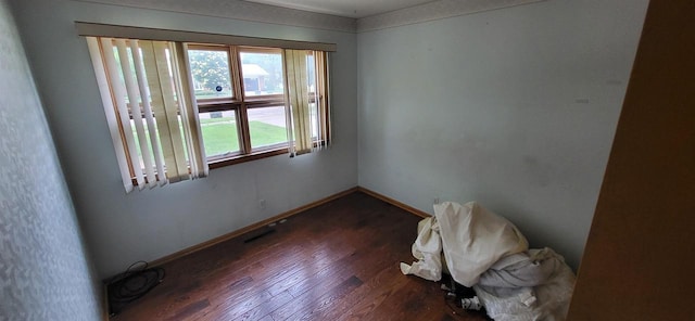 921 S 10th St, Wisconsin Rapids, WI 54494 - spare room featuring wood finished floors and baseboards