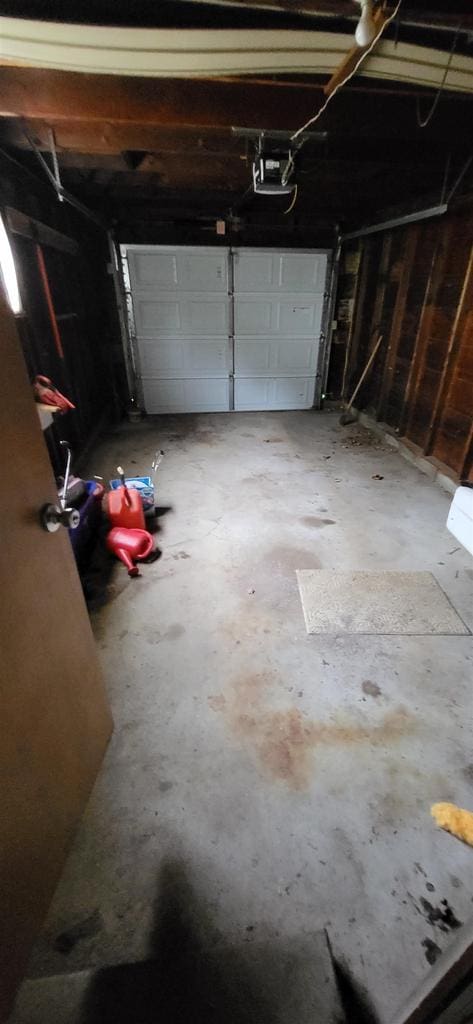 921 S 10th St, Wisconsin Rapids, WI 54494 - garage featuring a garage door opener