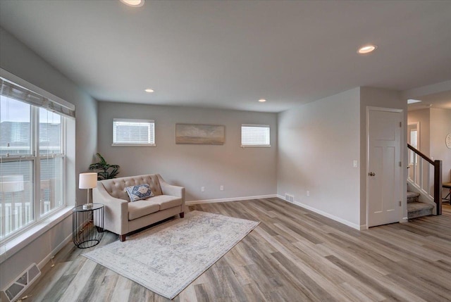 615 Prospect Rd, Waunakee, WI 53597 - sitting room featuring stairway, light wood-style floors, and recessed lighting