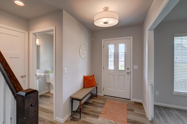 615 Prospect Rd, Waunakee, WI 53597 - entryway with wood finished floors and recessed lighting