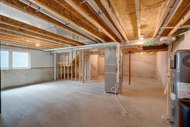 615 Prospect Rd, Waunakee, WI 53597 - basement with water heater, heating unit, and stairs