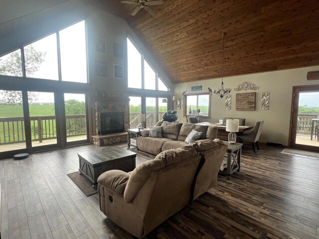 E3577 US Highway 14, Coon Valley, WI 54623 - living room with high vaulted ceiling, dark wood-type flooring, ceiling fan, and a chandelier