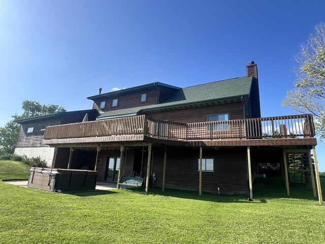 E3577 US Highway 14, Coon Valley, WI 54623 - rear view of property with a deck, a lawn, and a chimney