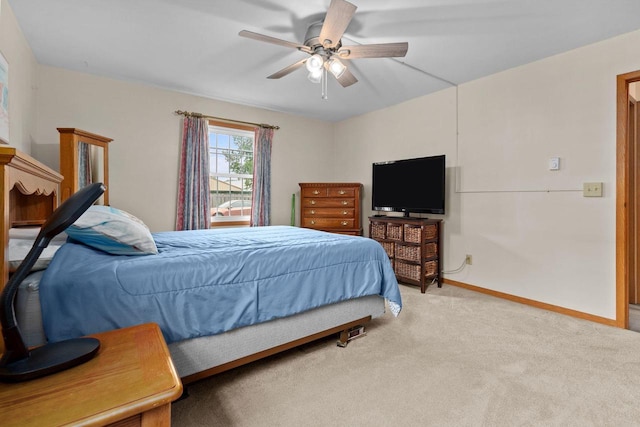 2360 Wisconsin St, Oshkosh, WI 54901 - carpeted bedroom featuring ceiling fan and baseboards
