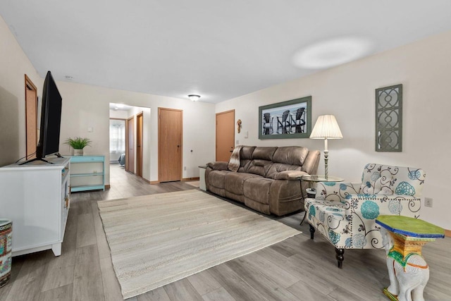 2360 Wisconsin St, Oshkosh, WI 54901 - living area featuring wood finished floors